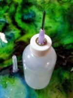 syringe-tip dispenser bottle