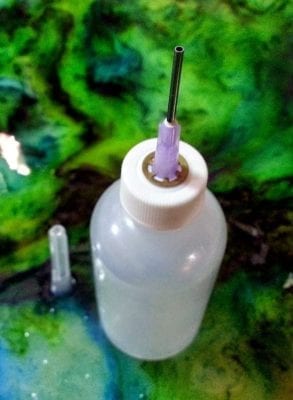 syringe-tip dispenser bottle